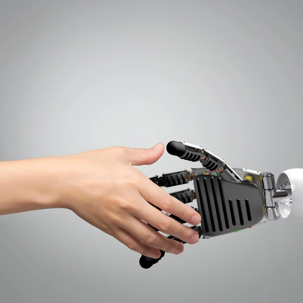 a human and a robot shaking hands